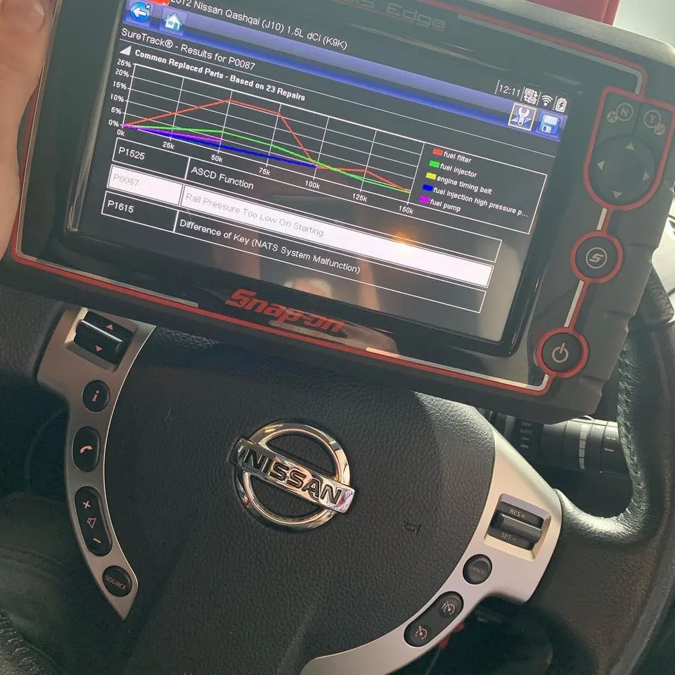 Laptop connected for an engine remap on a Nissan at CJ Performance Mansfield