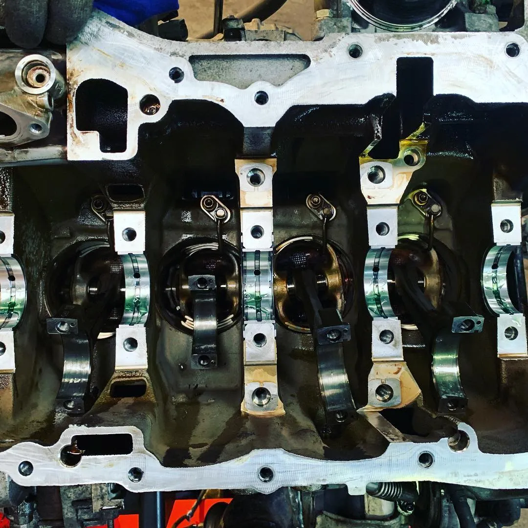 Engine block and crankshaft during a rebuild at CJ Performance Mansfield