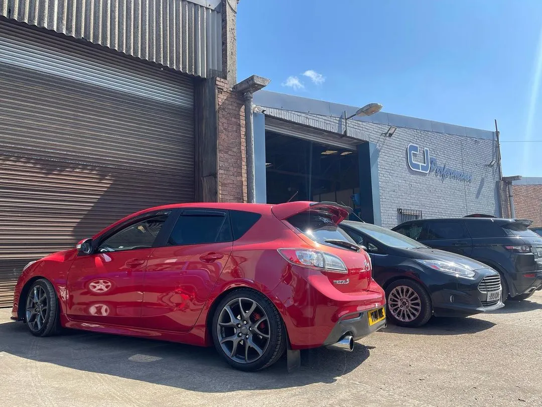Red Mazda 3 MPS outside the CJ Performance workshop in Mansfield