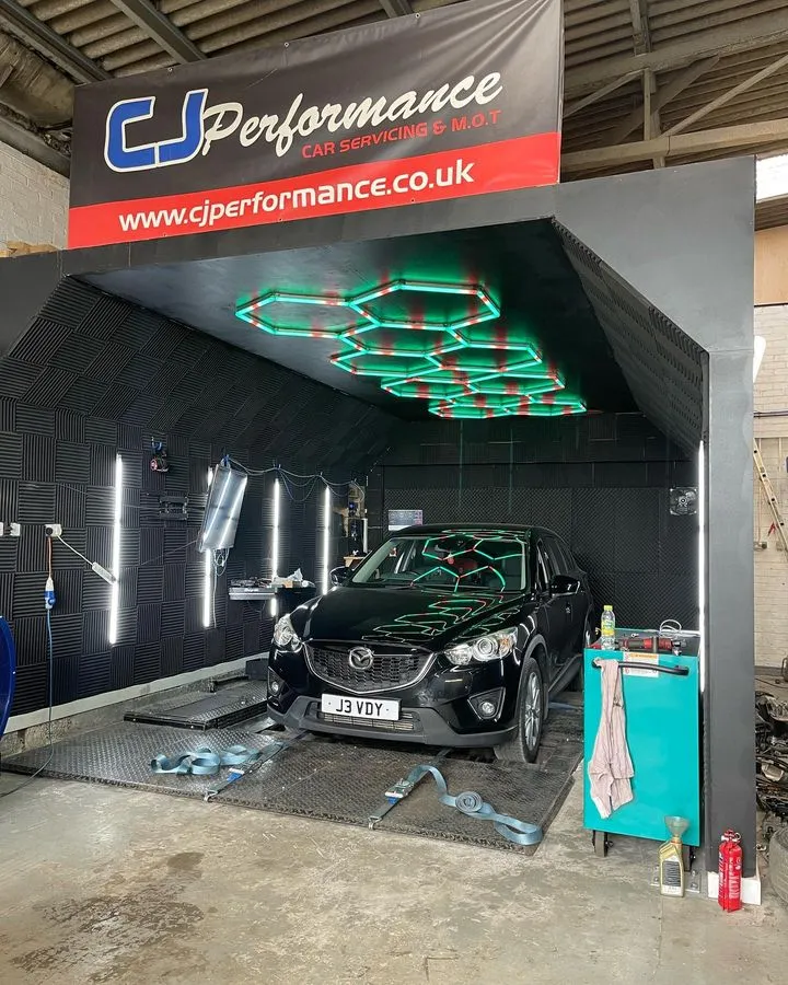 Inside the CJ Performance workshop in Mansfield with a car in the bay
